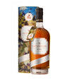 Cotswolds Amber Meadow Whisky bottle with amber-colored liquid and label, showcasing Cotswolds non-agency whisk(e)y on a wooden surface.