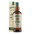 Dunvilles Three Crowns Peated Whiskey bottle with label and whiskey glass, showcasing the rich amber color of the spirit.