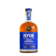 Bottle of HYDE Single Malt Whiskey, non-agency whisk(e)y with amber liquid in a clear glass bottle.
