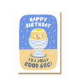 Front of Spiritly UK "To a Jolly Good Egg" birthday card featuring a colorful, cheerful egg illustration with playful lettering.