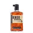 Bottle of Knob Creek 9 Years Small Batch Whiskey, a rich amber non-agency whisk(e)y with a classic label.