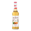 Bottle of Monin Amaretto Syrup with a clear label, showcasing the Monin brand and the amber-colored sweet almond flavor.
