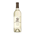 Stag's Leap Wine Cellars Aveta Sauvignon Blanc wholesale white wine bottle on a wooden table with a wine glass.