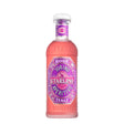Bottle of Starlino Rose Aperitivo, a non-agency pink spirit with a stylish label, displayed on a wooden surface.