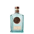 Bottle of Brooklyn Gin, a non-agency gin with a clear glass bottle and Brooklyn Gin label, displayed on a wooden surface.
