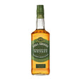 Ezra Brooks Rye Whiskey bottle on a wooden surface, showcasing the label and amber-colored spirit inside.