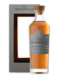 Irishman 12 Years single malt whiskey bottle with label and glass, showcasing rich amber color in a close-up shot.