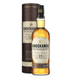 A bottle of Knockando 15 Years Whisky, a non-agency Scotch whisky, with a clear label and amber-colored liquid inside.