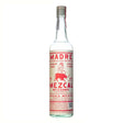 Bottle of Madre Mezcal Ensamble, a non-agency spirit, with a traditional label and clear glass showcasing the artisanal Mexican mezcal