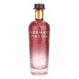 Bottle of Mermaid Pink Gin, a non-agency gin with a vibrant pink color and elegant label, displayed on a wooden surface.