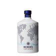 Bottle of Nordes Non Agency Gin with label visible, showcasing clear glass and elegant design.