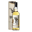 Bottle of Peats Beast Cask Strength Whisky, non-agency whisky with dark amber liquid and detailed label on a wooden surface.