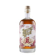 Pirate's Grog 5 Years Non-Agency Gold Rum bottle with dark amber liquid and label, highlighting premium aged rum.