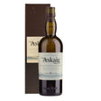 Bottle of Port Askaig 8 Years non-agency whisky featuring a dark label and clear glass bottle on a wooden surface.