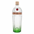 Bottle of Tanqueray Ten Grapefruit & Rosemary Gin, a non-agency gin with a clear label featuring grapefruit and rosemary illustrations.