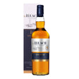 Bottle of The Ileach Non-Agency Whisky with label visible, showcasing amber-colored whisky in a clear glass bottle.