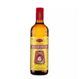 Bottle of Velho Barreiro Cachaca, a non-agency spirit, with a white label and clear glass bottle, displayed on a wooden surface.